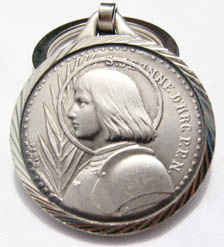 front side of animported St. Joan medal/keychain