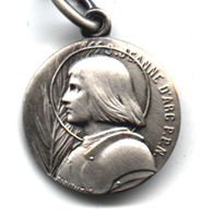 the back side of an imported St. Joan medal