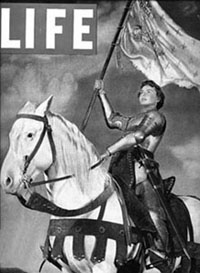 Joan on horseback with banner unfurled