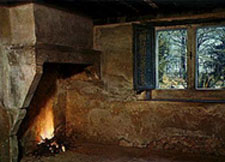 picture of the fireplace in the main room of Joan's house